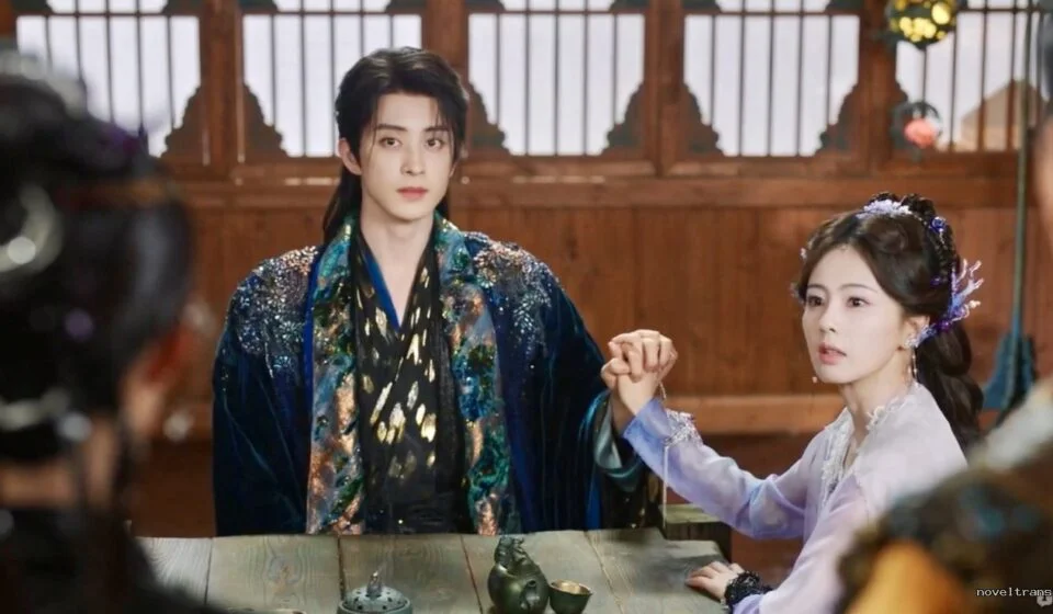 Сцена из исторической драмы с двумя персонажами за столом