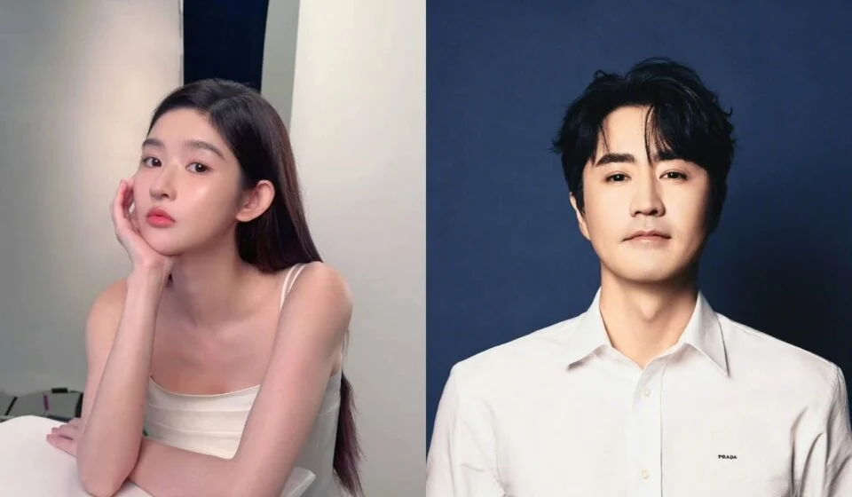 Два человека в студии, женщина и мужчина в белых одеждах.